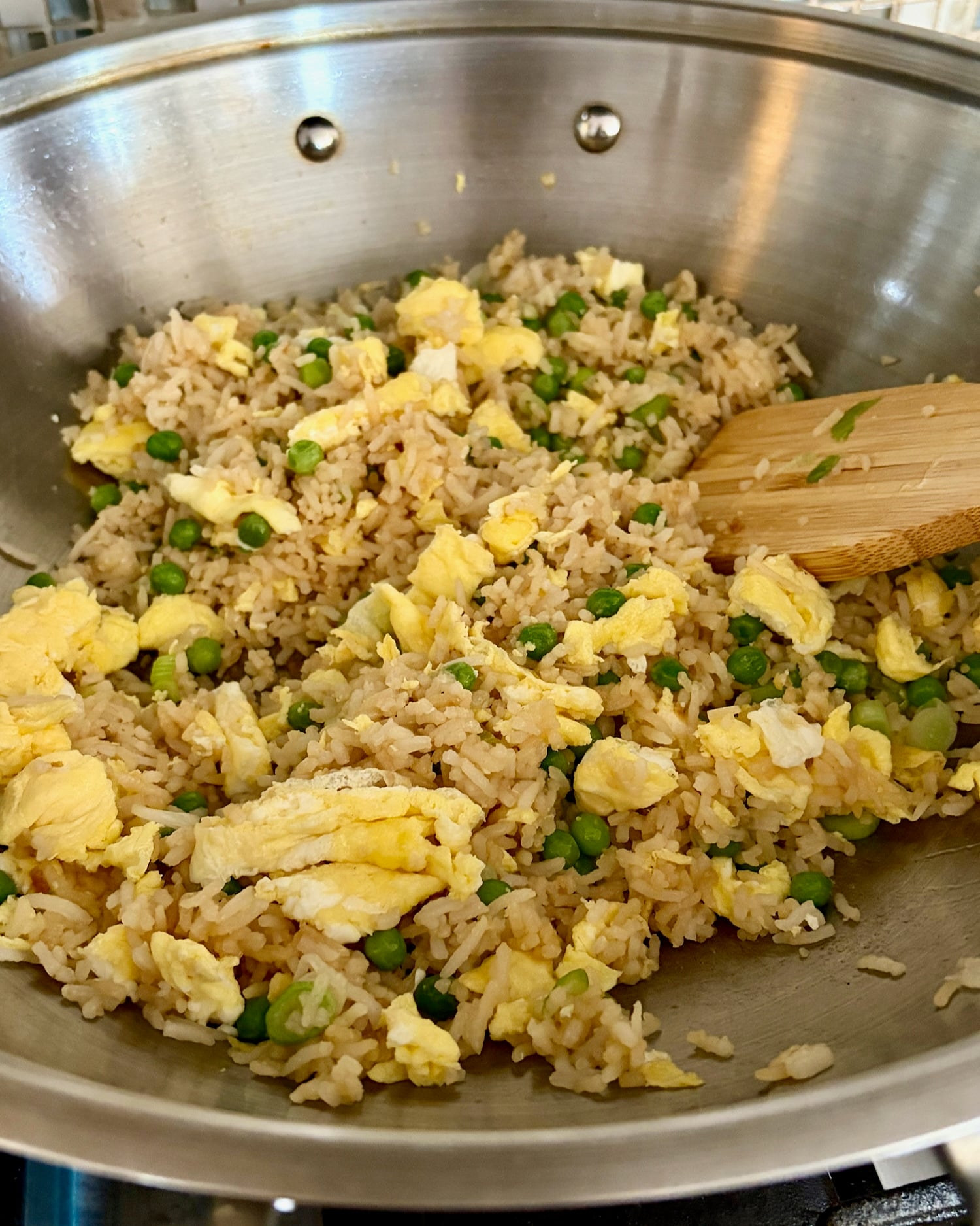 Tossing Egg Fried Rice in a hot wok