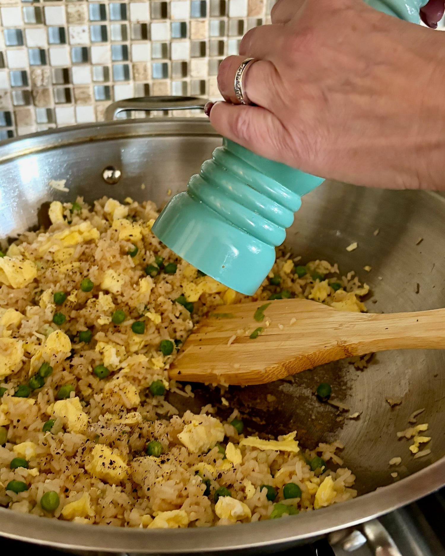 seasoning Egg Fried Rice with black pepper