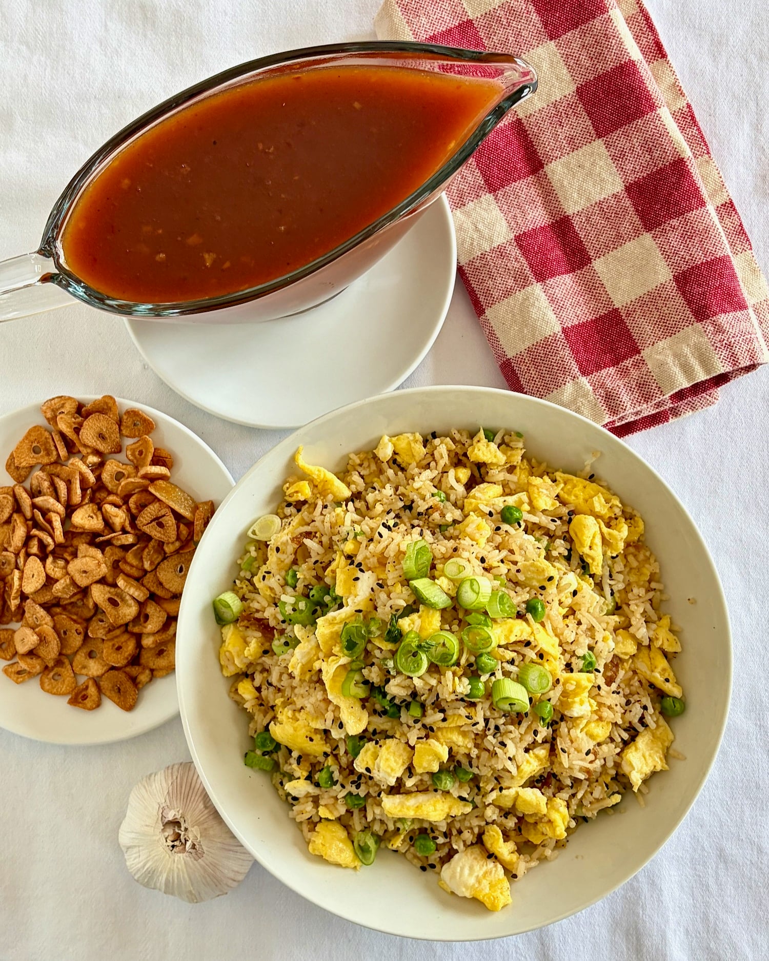 Overhead shot of Egg Fried Rice with side dishes