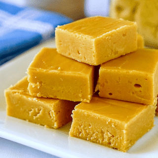 Old Fashioned Brown Sugar Fudge close up photo on a white plate