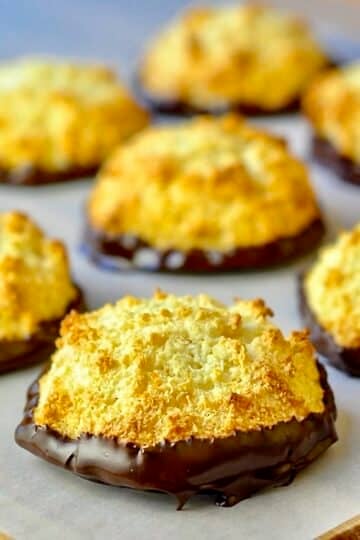 Orange Chocolate Macaroons on parchment paper.