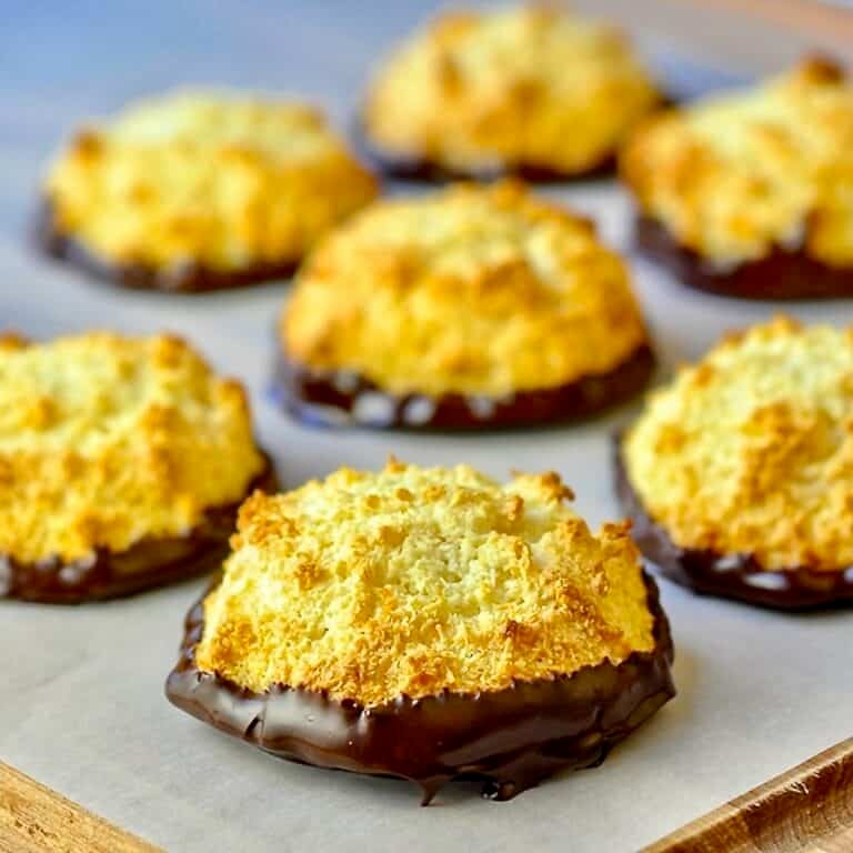 Orange Chocolate Macaroons on parchment paper.