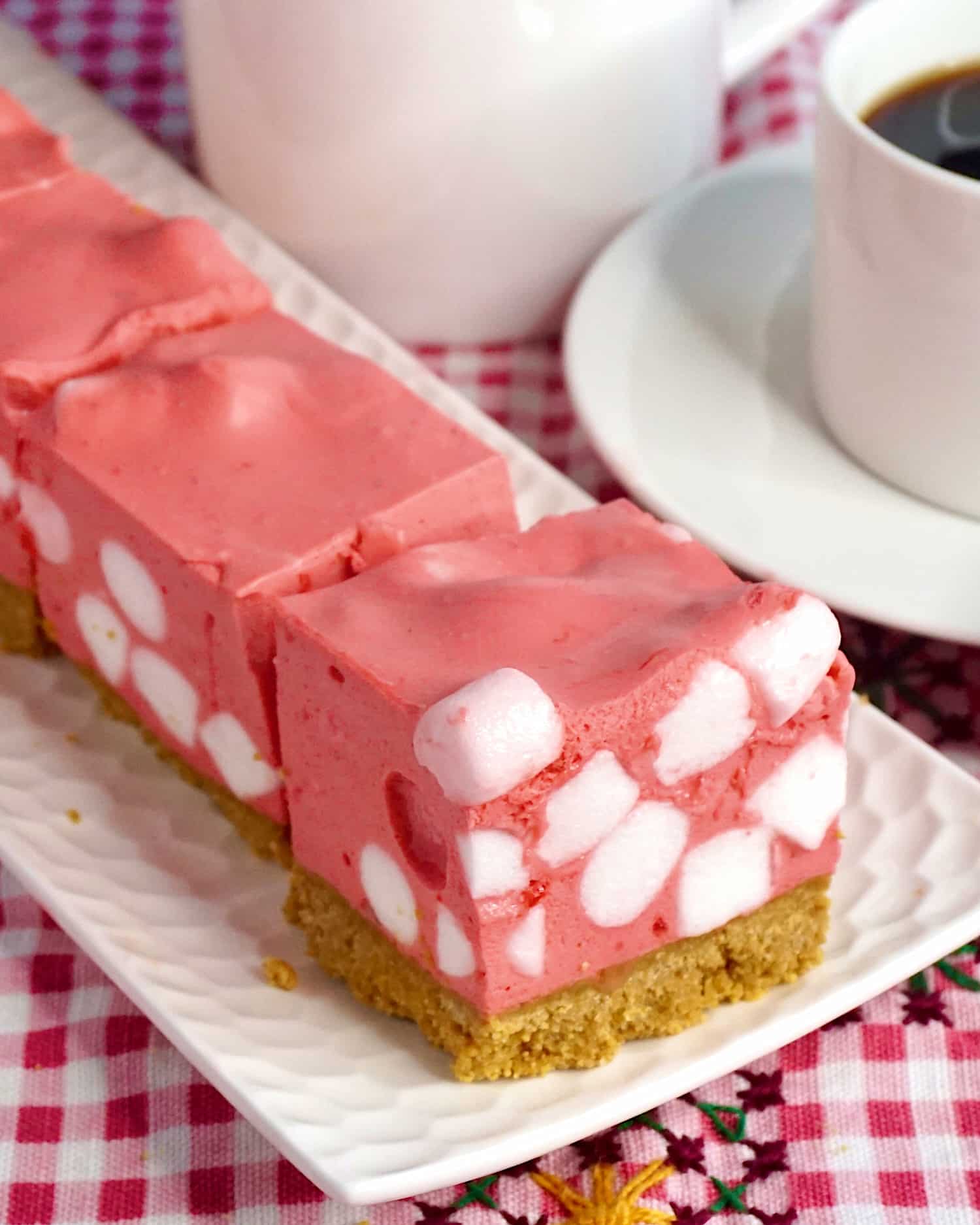 Raspberry Marshmallow Chiffon Squares photo with coffee on the side.
