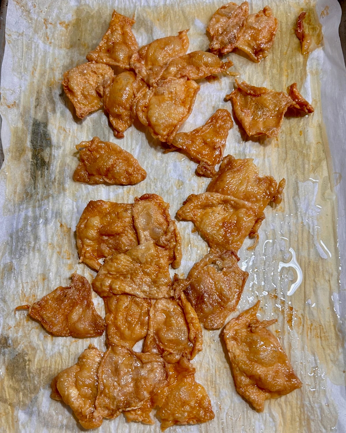 photo of crispy chicken skins out of the oven