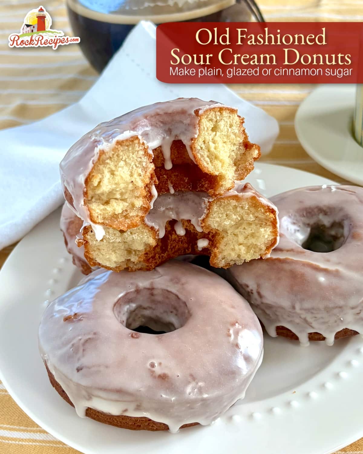 Photo of vanilla glazed sour cream donuts with title text and rock recipes logo added for social media posts and Pinterest,