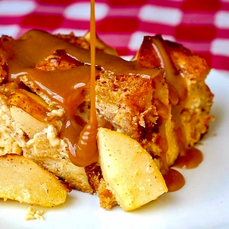 Spiced Pear Bread Pudding close up photo of a singe serving for google featured image.