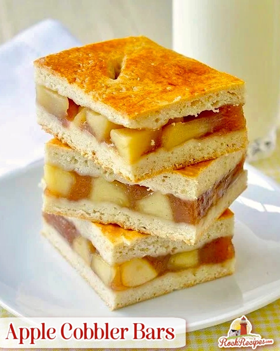 Photo of stacked apple cobbler bars on a yellow background with title text overlay.