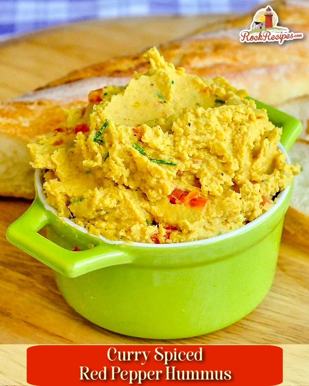 Curry Spiced Roasted Red Pepper Hummus photo with title text for Pinterest and social media posts.