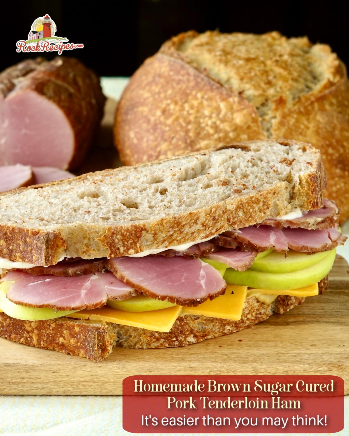 Homemade Tenderloin Ham photo shown in a sandwich with apple slices and cheddar and with title text added for social media posts.