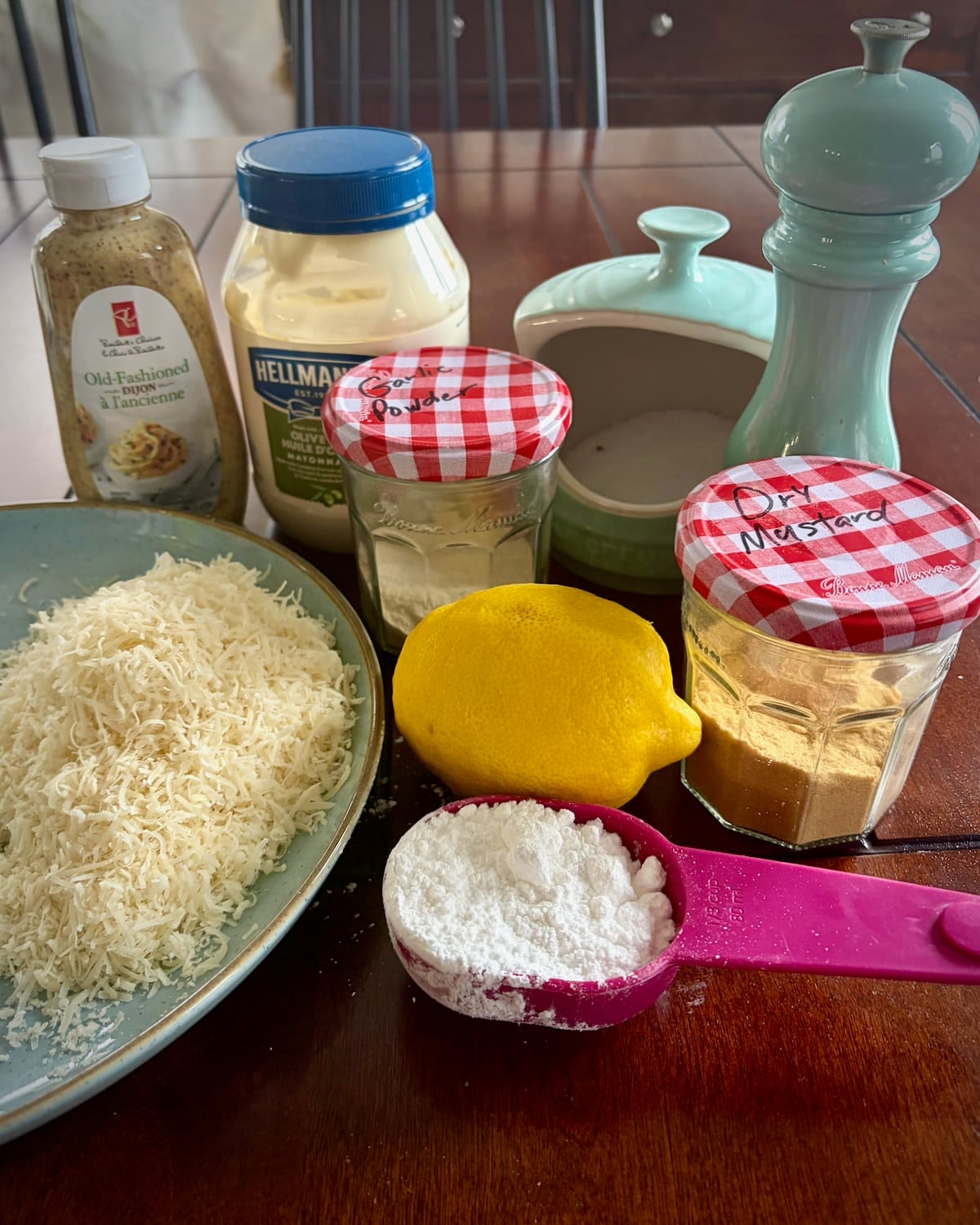 Photo of all the ingredients needed for Creamy Lemon Parmesan Salad Dressing.