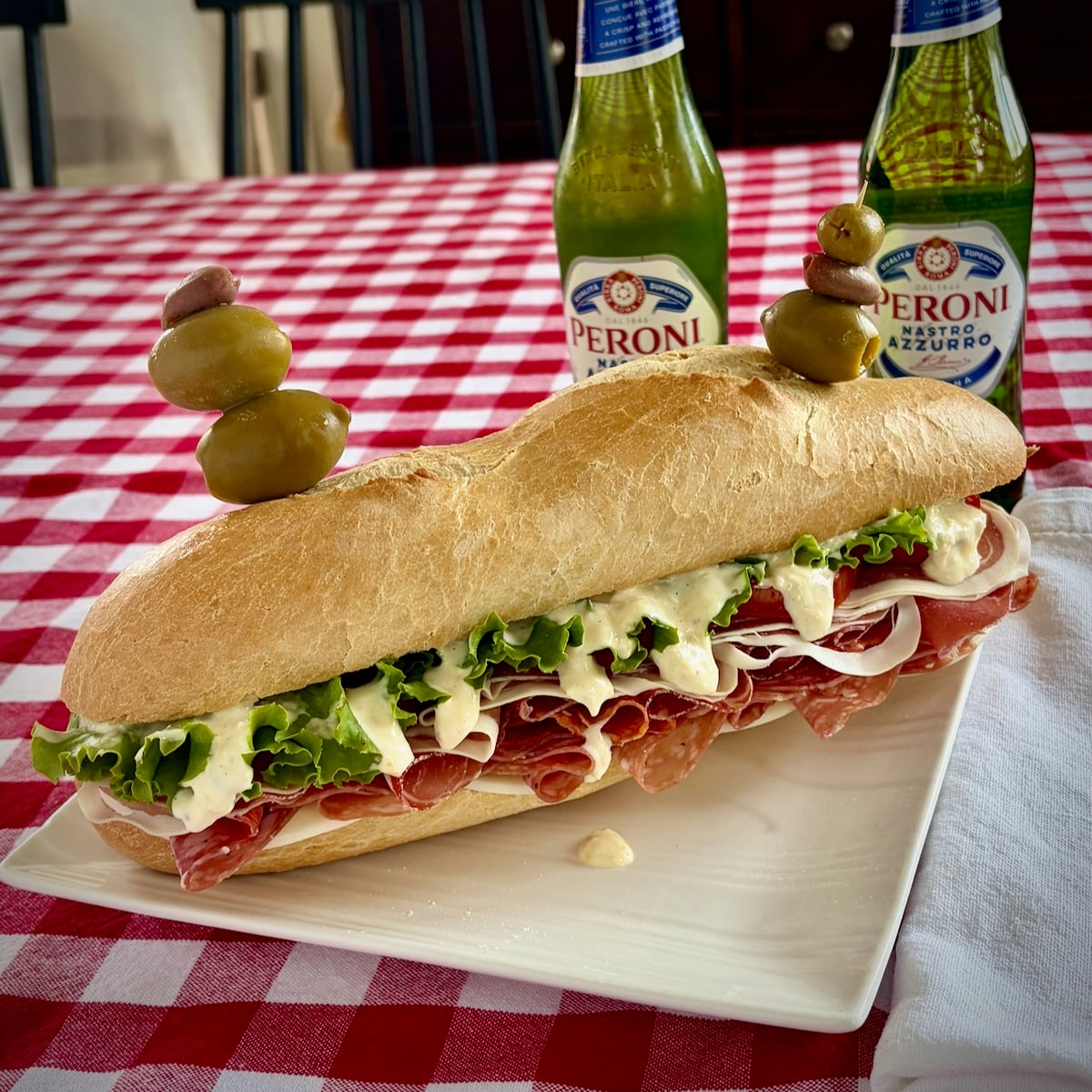 Photo of uncut Italian sub with Creamy Lemon Parmesan Salad Dressing
