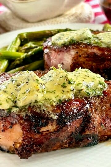 Garlic Herb Butter pictured melting over smoked Nagano Pork Chops.