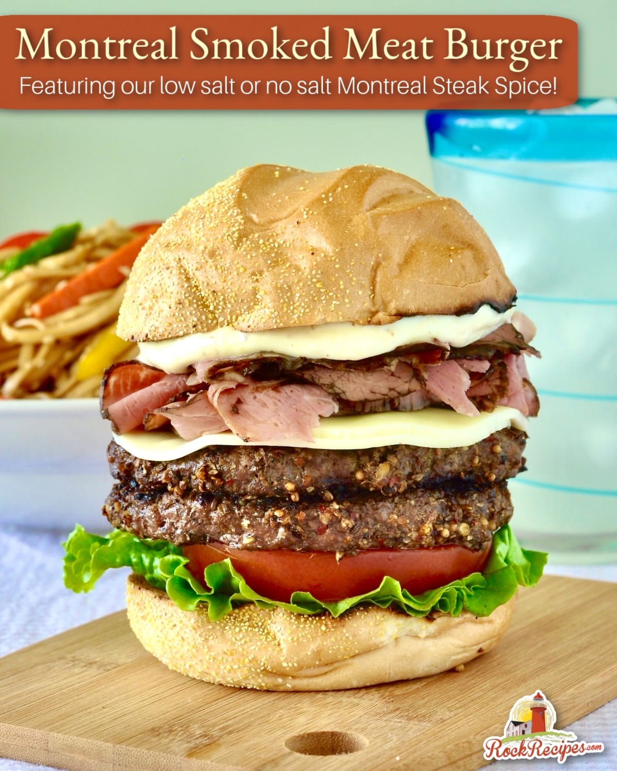 Montreal Smoked Meat Burger shown on a wooden cutting board with title text added to photo for social media posts.
