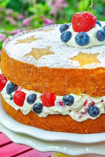 Red White and Blue Mascarpone Cream Cake close up photo of uncut cake