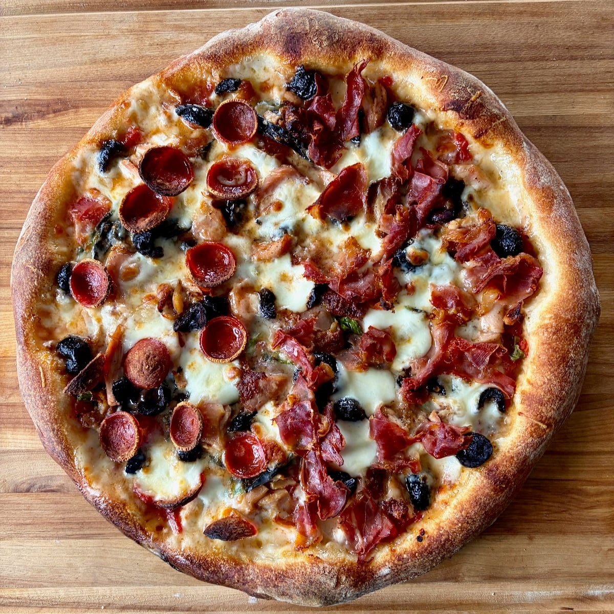Authentic Neapolitan Pizza Dough photo of Whole uncut smoked chicken pizza.