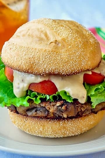 Photo of one Vegetarian Mushroom Burger fully dressed