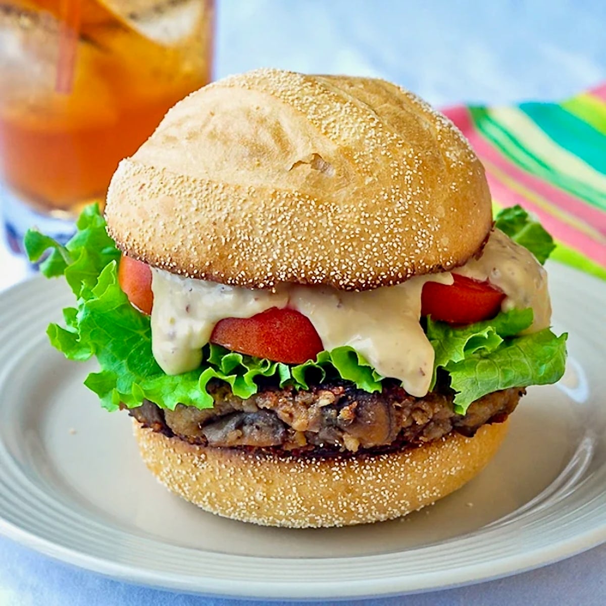 Photo of one Vegetarian Mushroom Burger fully dressed