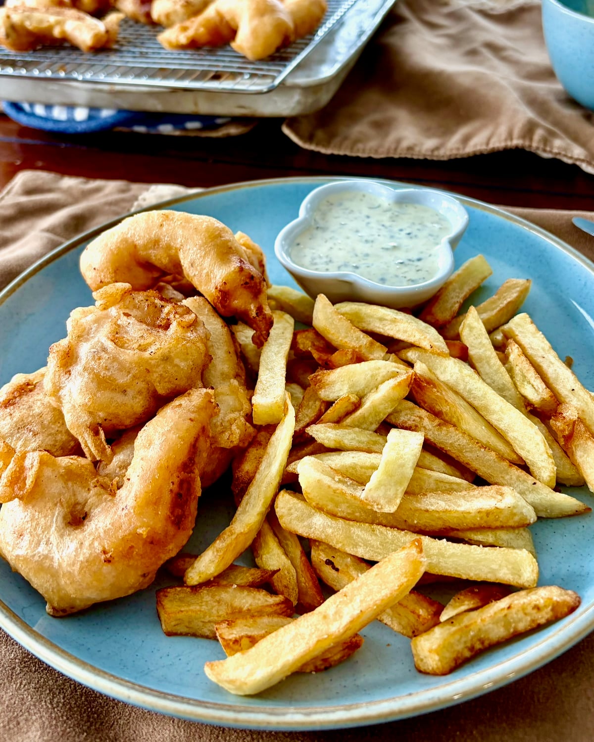 Photo of Shrimp & Chips. Served with Lime Caper Tartar Sauce.