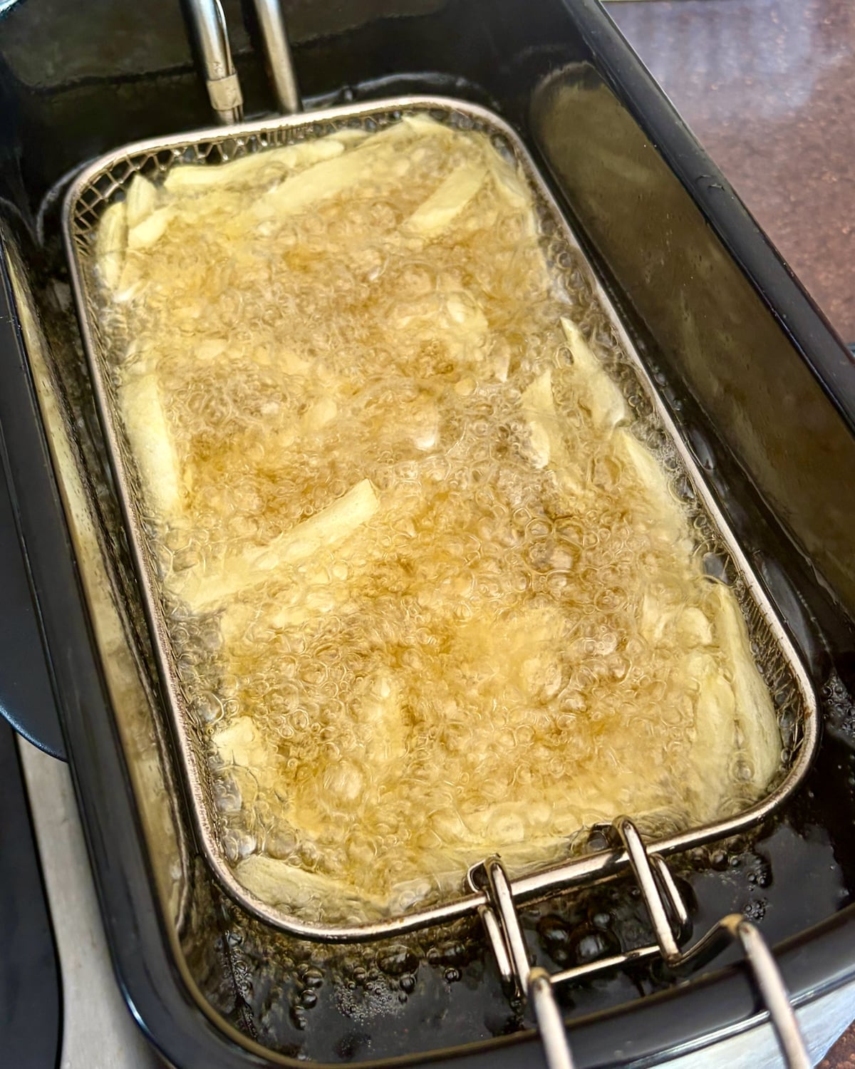 photo of Cold Oil French Fries when they start to bubble.