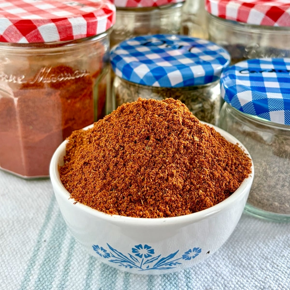 Photo of Copycat Old Bay Seasoning in a small white bowl for Google featured image.