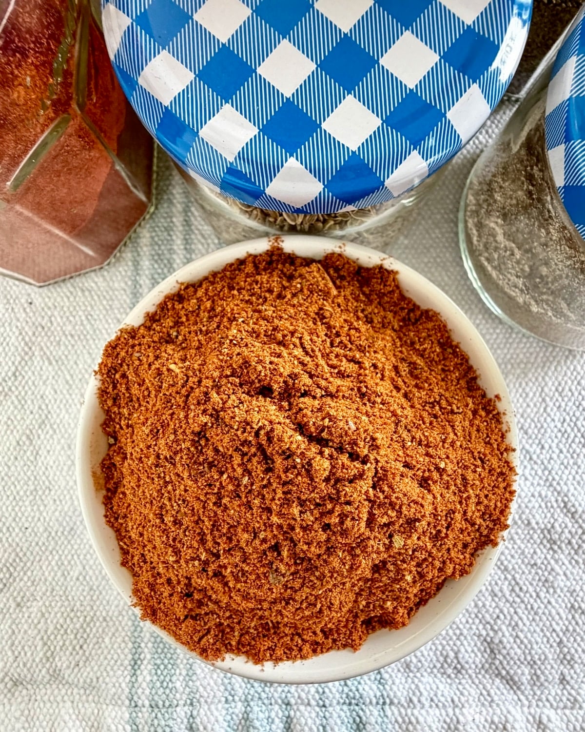 Overhead photo of Photo of Copycat Old Bay Seasoning in a small white bowl.