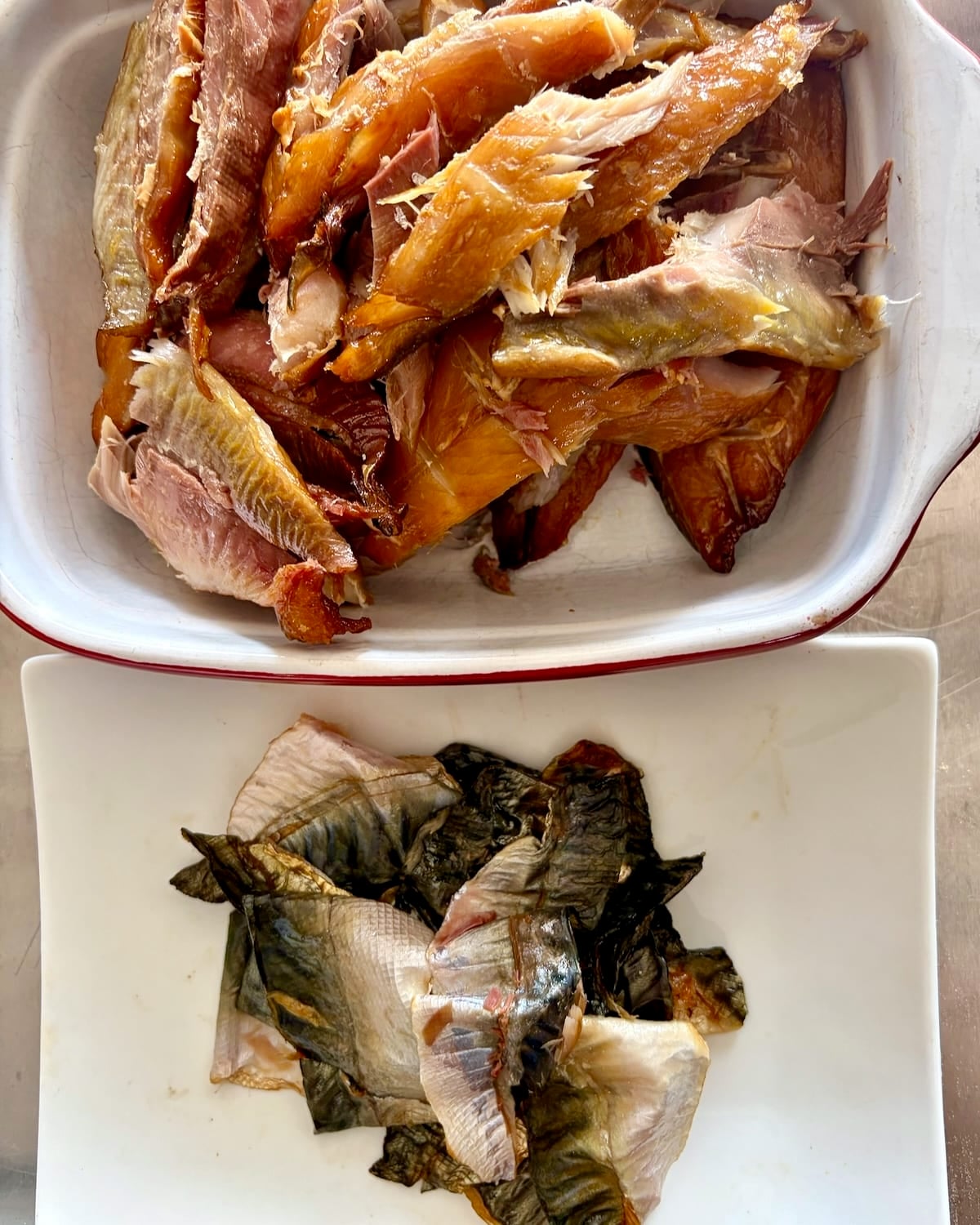 Photo of the skins being removed from the fish fillets.