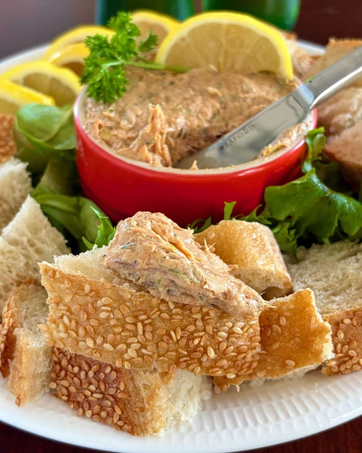 Photo of smoked fish dip speared in Belgian bread.