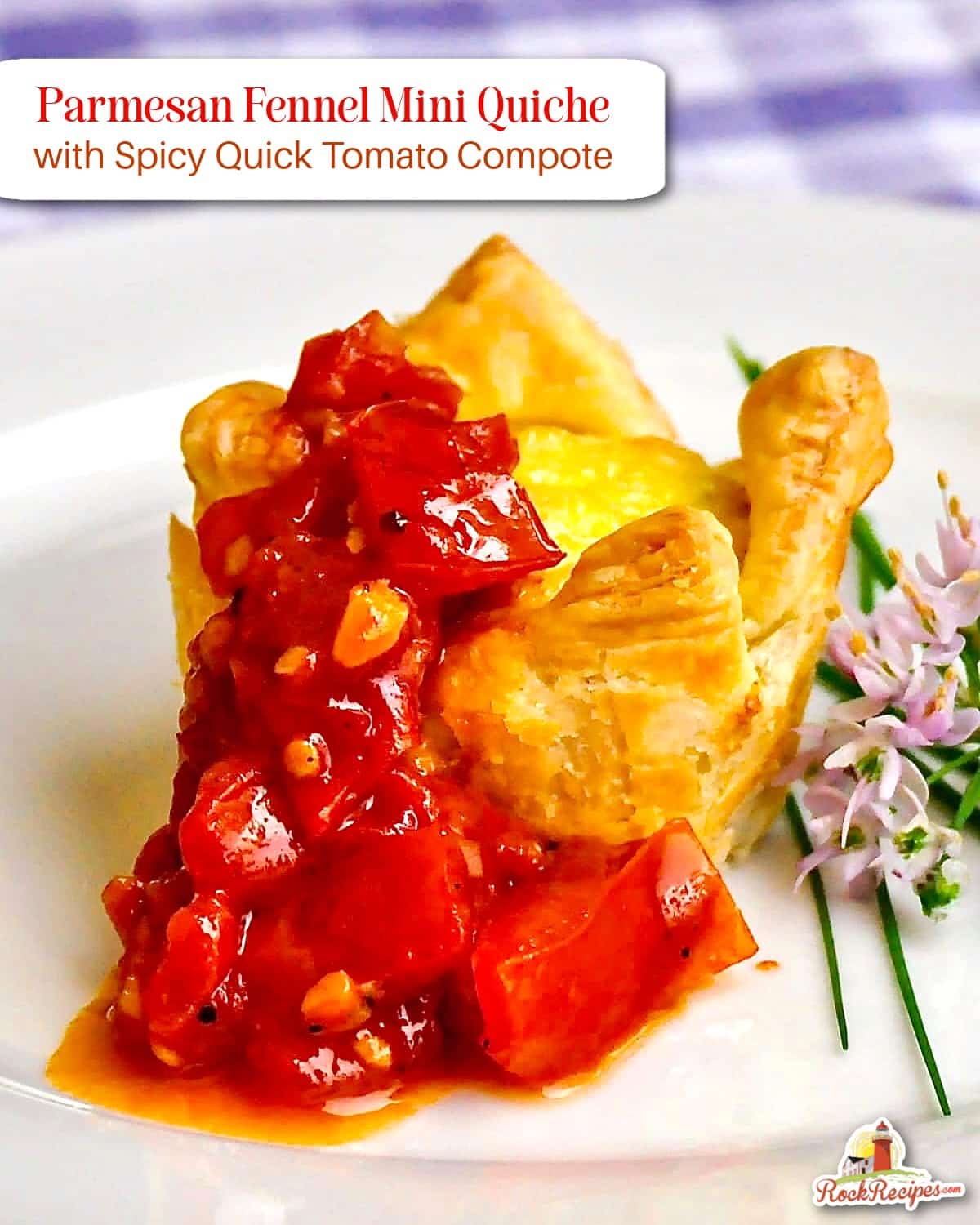 Parmesan Fennel Mini Quiche with Spicy Quick Tomato Compote. Close up photo of one serving on a white plate with chive flower garnish and title text added for social media posts.
