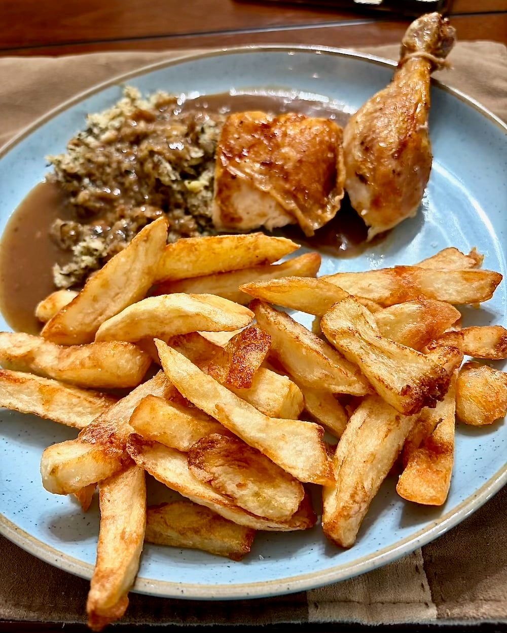 Photo of Cold Oil French Fries served with roast chicken.
