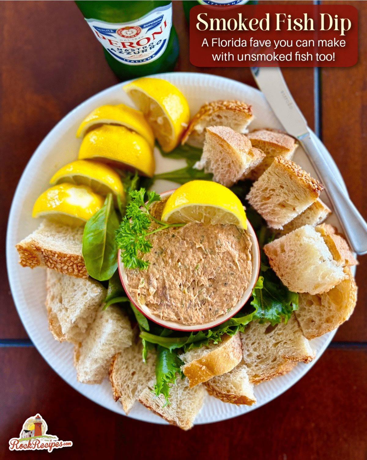 Overhead photo of smoked fish dip with slices and chunks of Belgian bread.. This photo has the post title text and Rock Recipes logo added for Pinterest and social media posts.