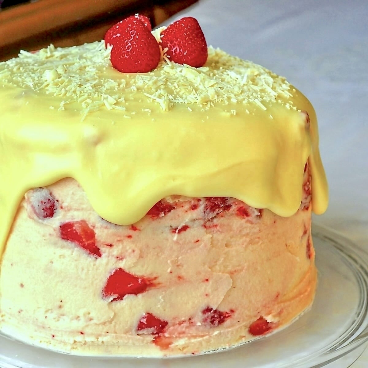 Photo of Uncut Strawberry White Chocolate Buttercream Cake.