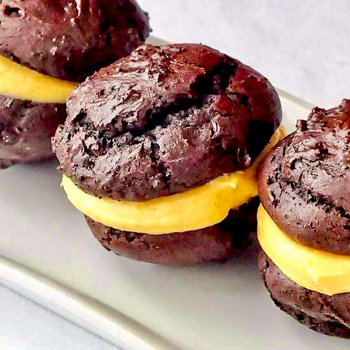 Chocolate Pumpkin Spice Whoopie Pies close up image for featured photo