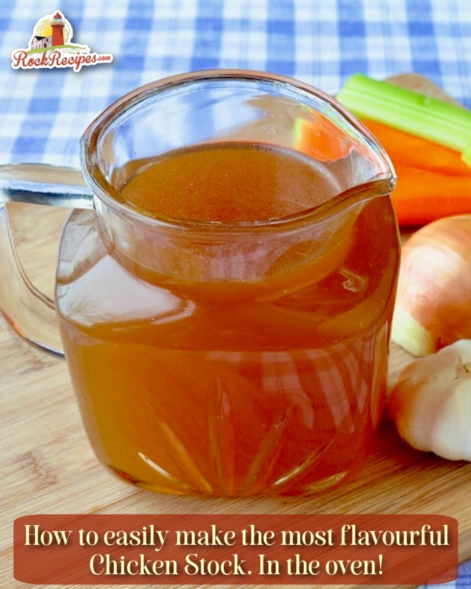 Close up photo of a vintage glass jug filled with stock and vegetables in the background. Title text and Rock Recipes logo have been added for Pinterest and social media posts.