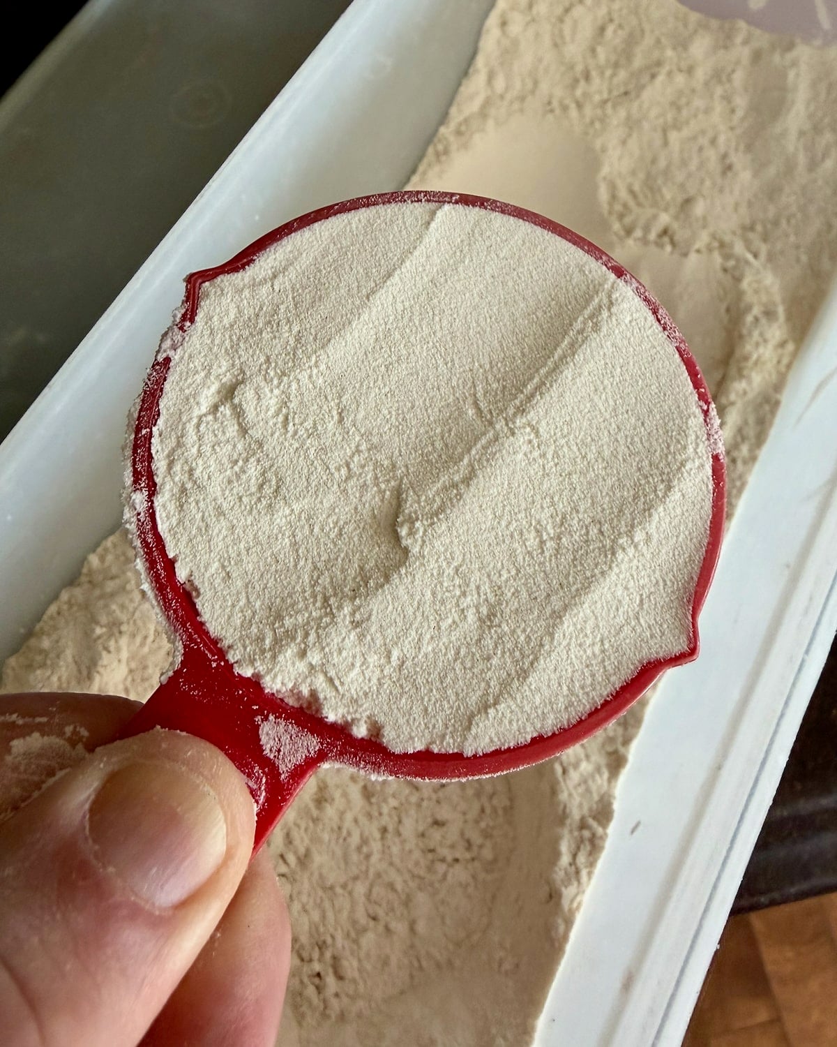 Photo of ¼ cup flour.