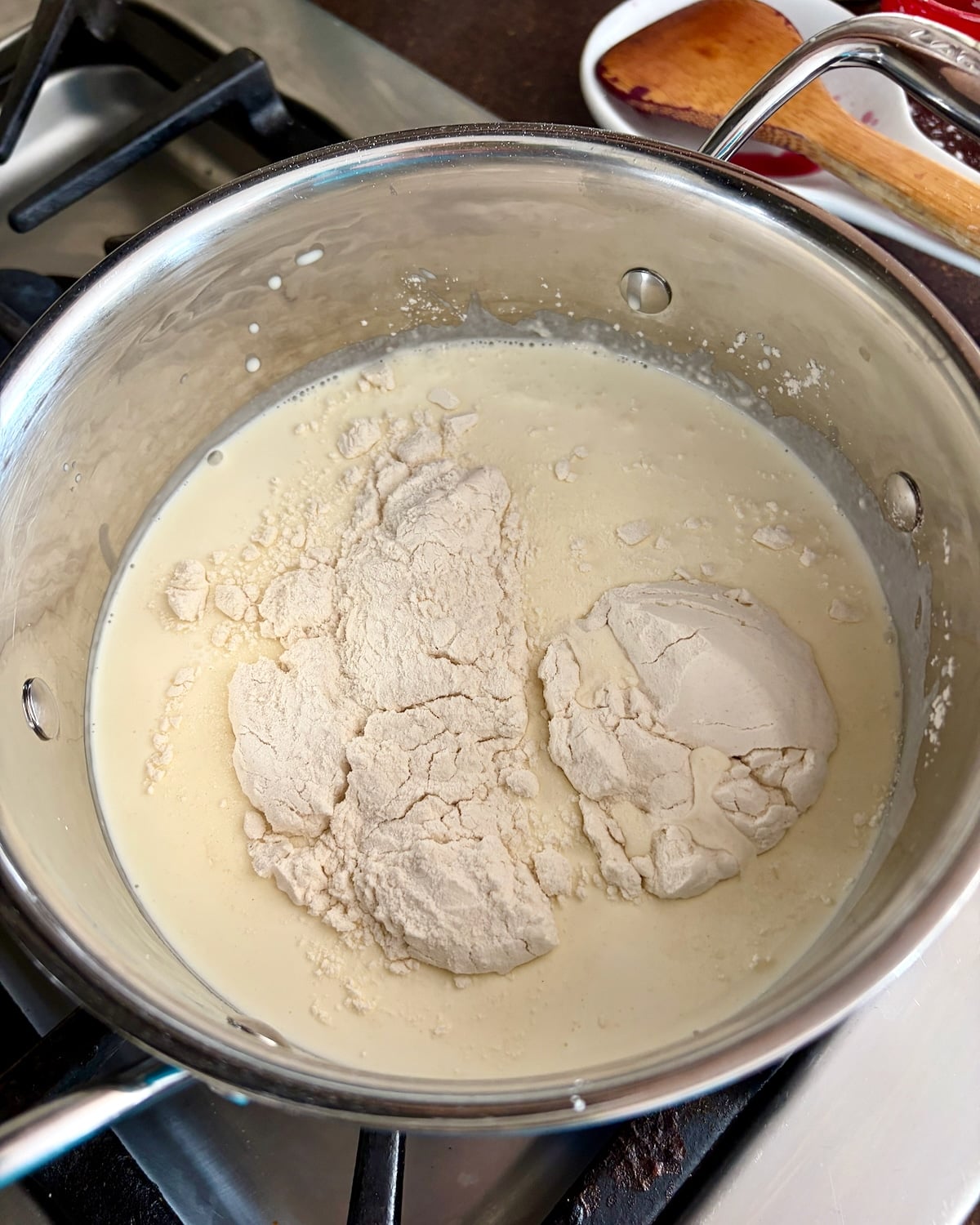 Photo of flour added to milk