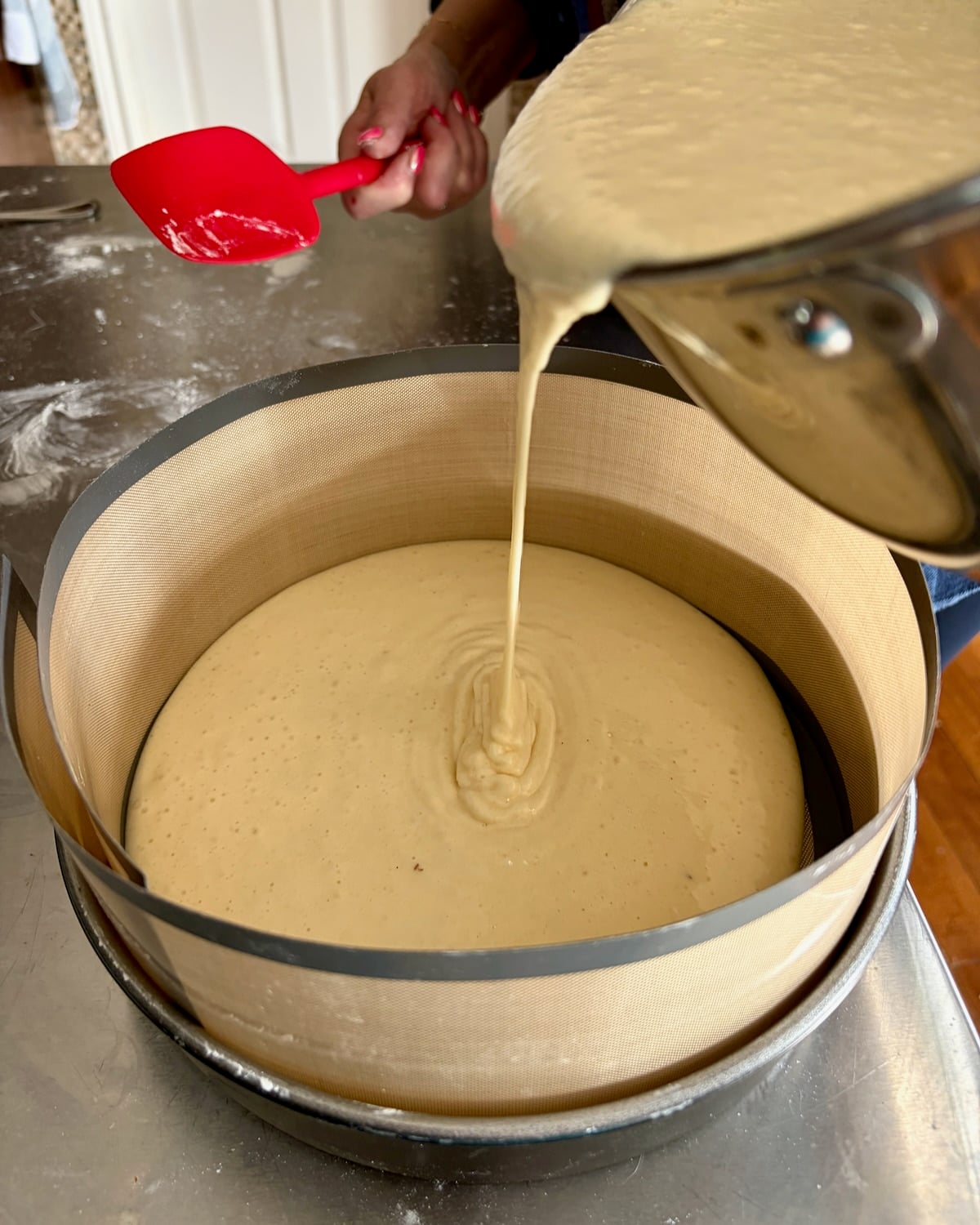 Photo of batter being pored into the prepared pans.