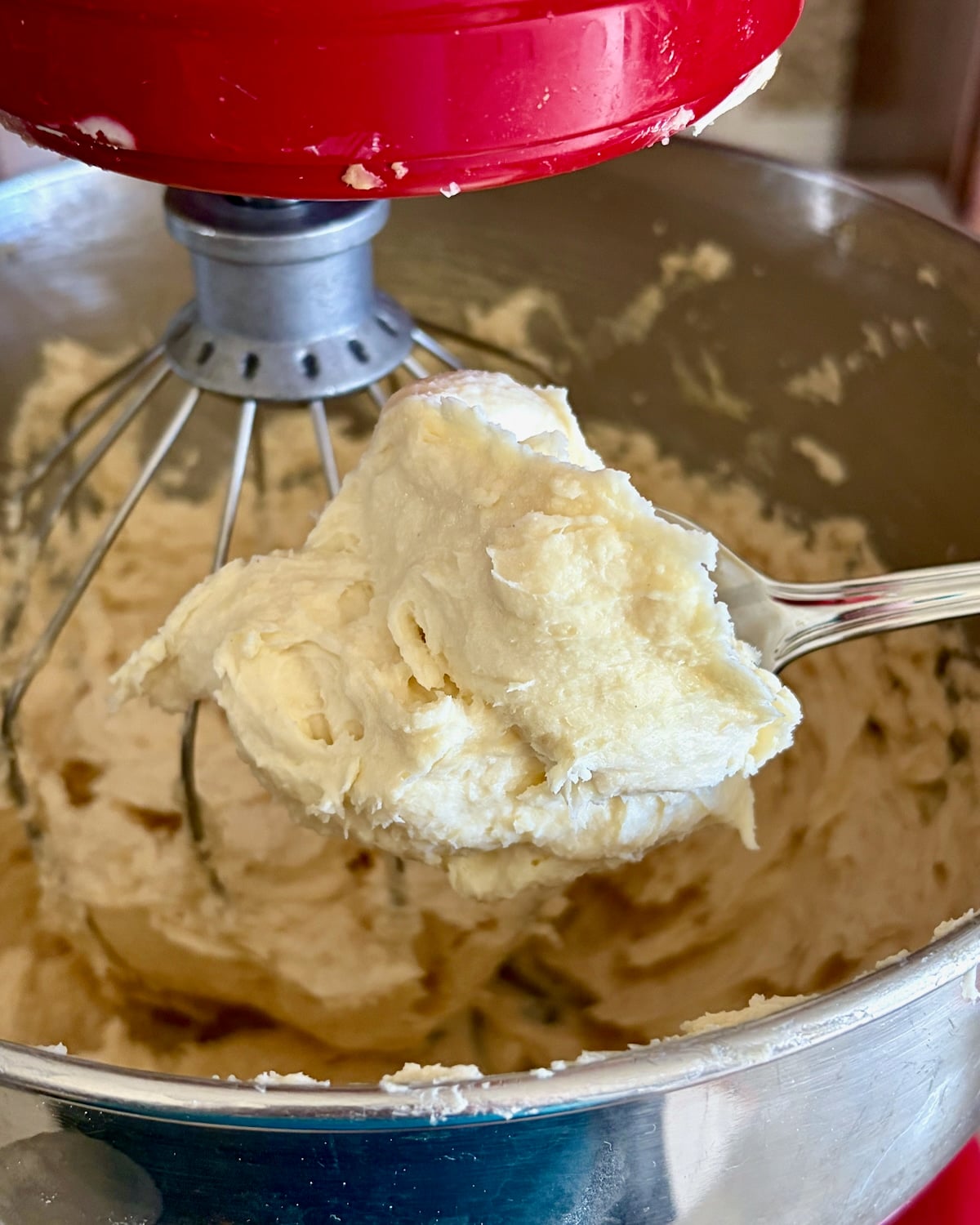 Photo of roux being added to the Ermine Cream Frosting.