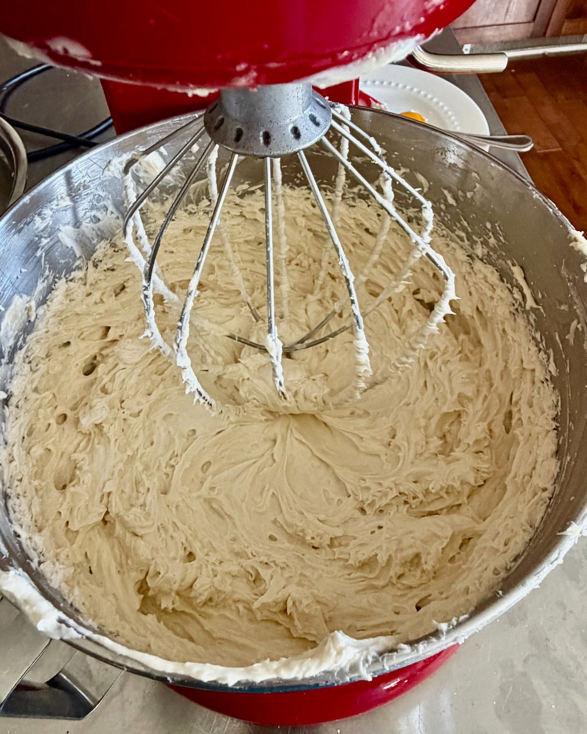 Photo of Ermine Cream Frosting nearing completion.
