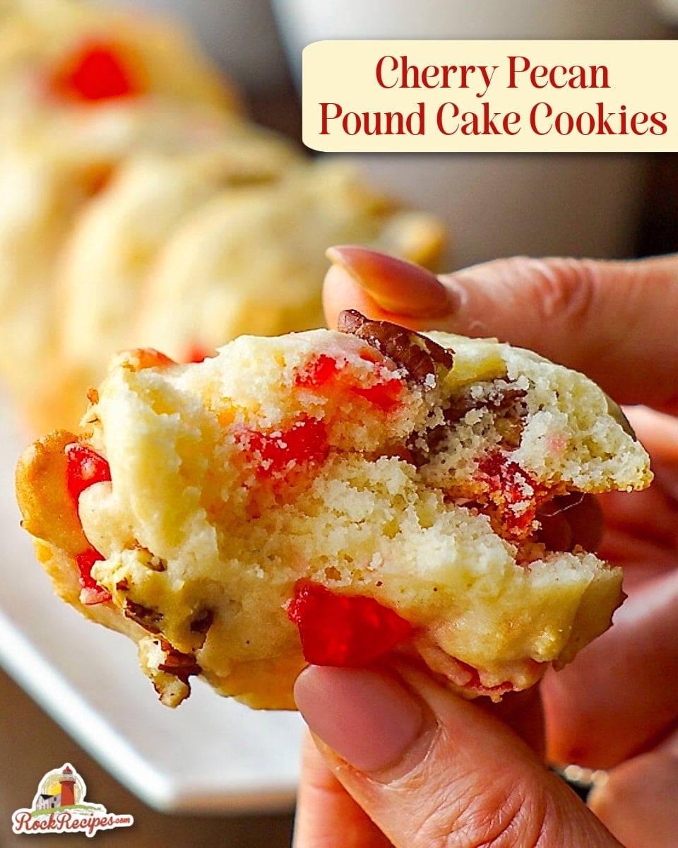 Cookie being broken open to show inside of these soft Cream Cheese Cookies with title text added for Pinterest and social media posts.
