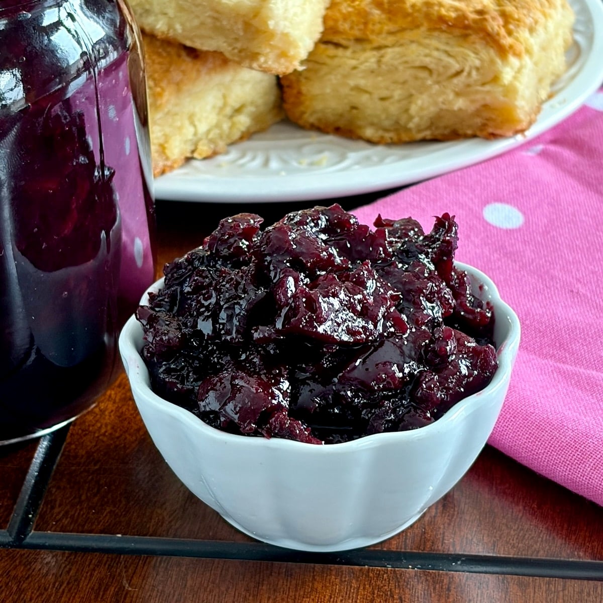 Low Sugar Blueberry Cherry Jam.shown in a white ramekin.