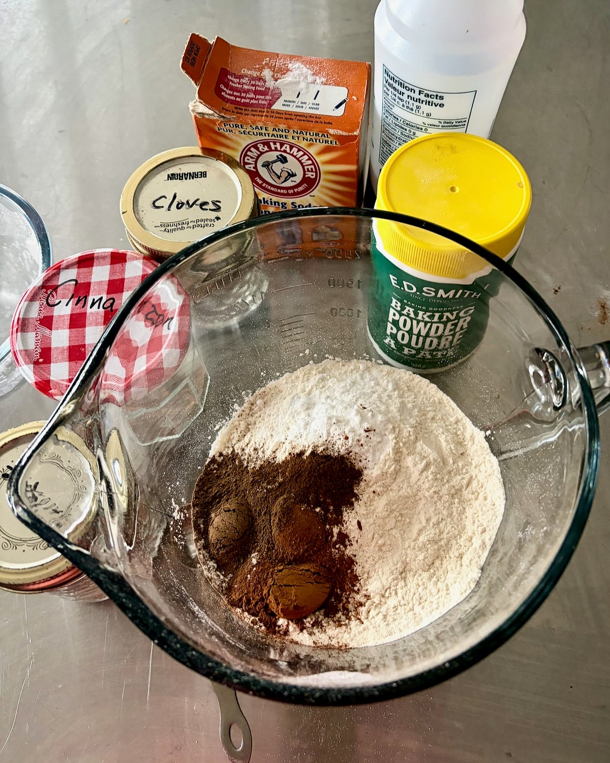 Photo of spices being aded to dry ingredients.