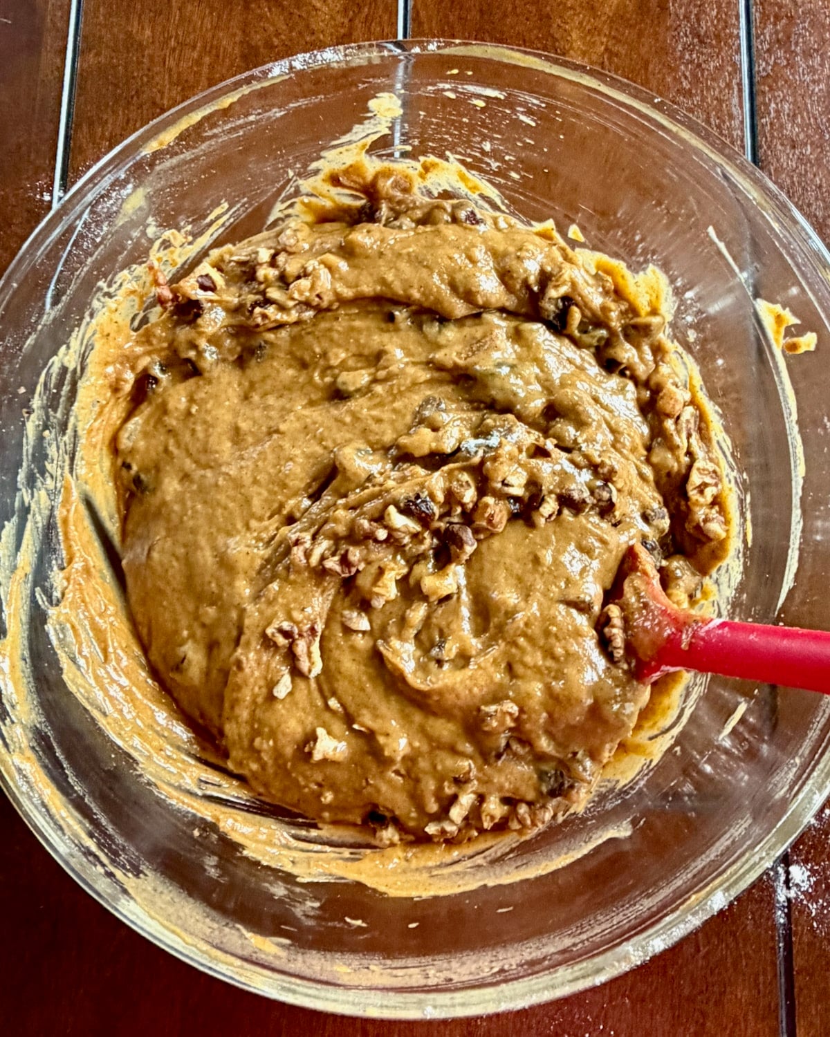 Photo of walnuts being folded in.