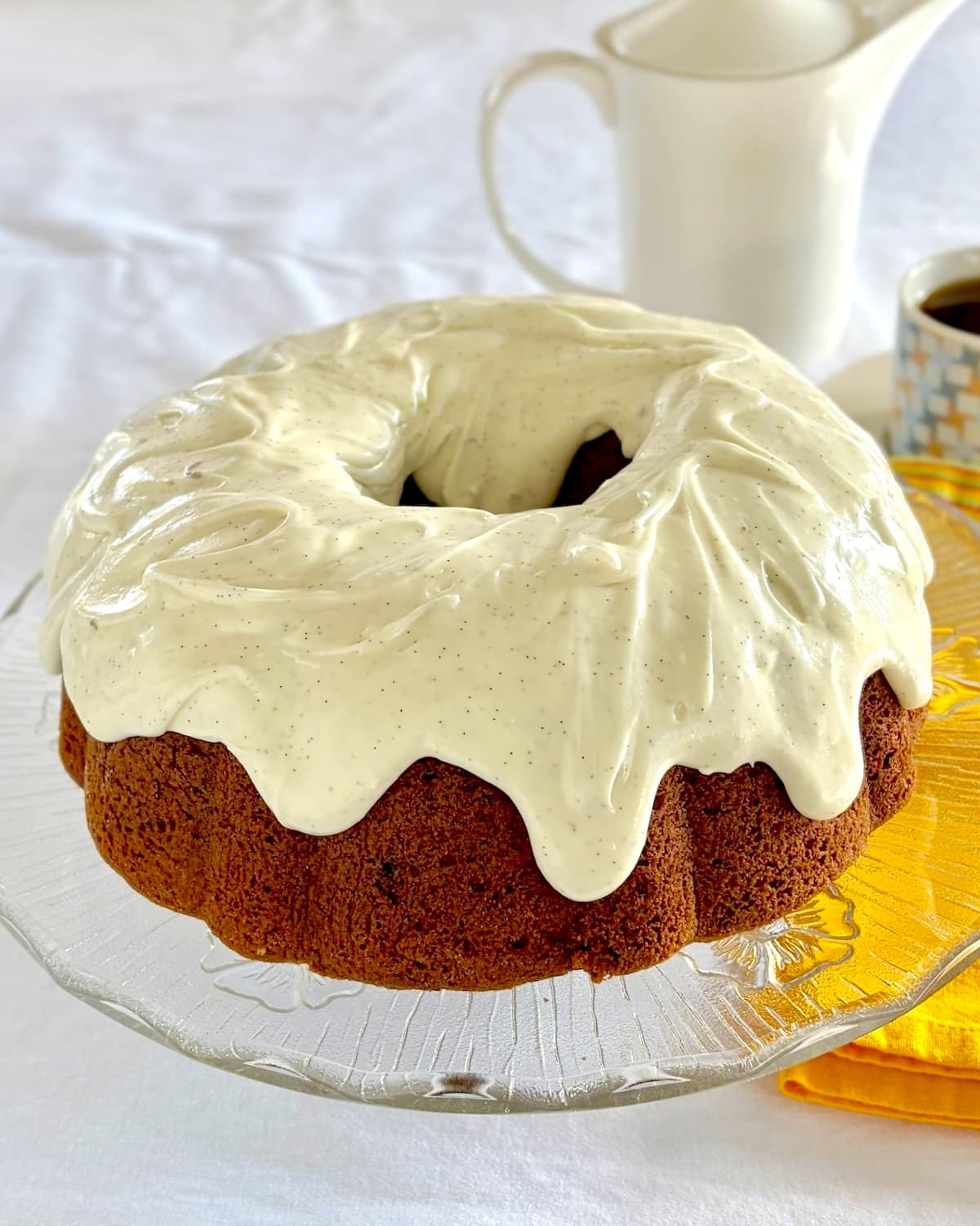 Photo of uncut Pumpkin Spice Walnut Cake.