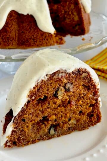 photo of one slice of Pumpkin Spice Walnut Cake.