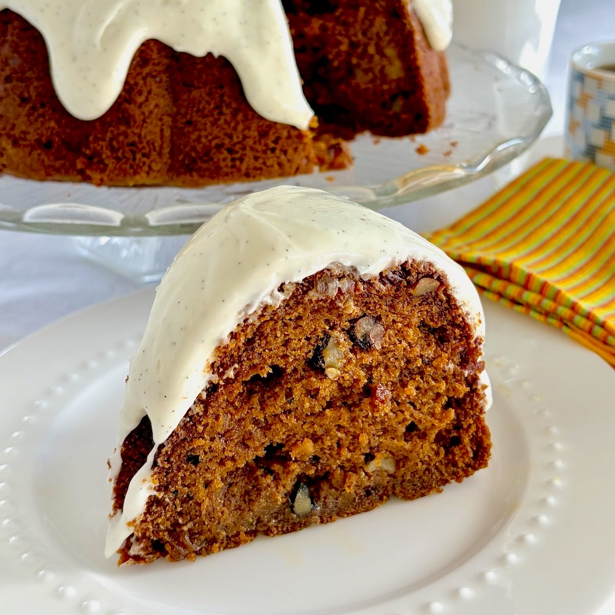 photo of one slice of Pumpkin Spice Walnut Cake.