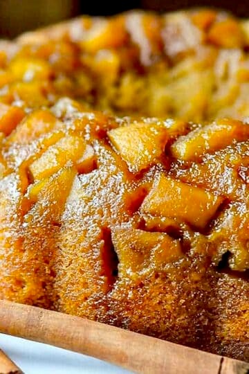 Sticky Toffee Apple Cake close up image if uncut cake for Google featured image.