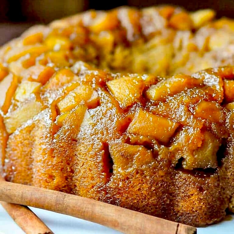 Sticky Toffee Apple Cake close up image if uncut cake for Google featured image.
